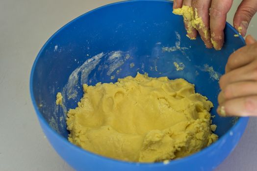 ready-made shortcrust pastry in a blue bowl