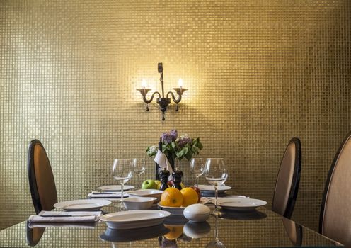 Set the table in the golden living room  
