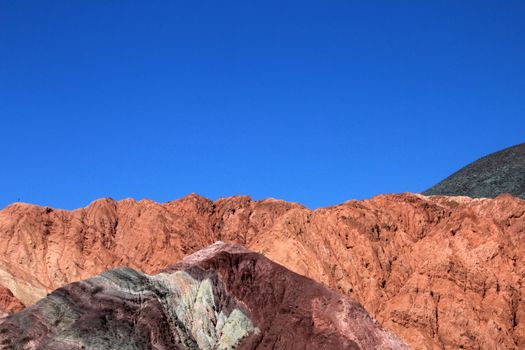 The hill of seven colors, cerro de los siete colores, at Purmamarca, UNESCO world heritage quebrada de humahuaca, Jujuy, Argentina