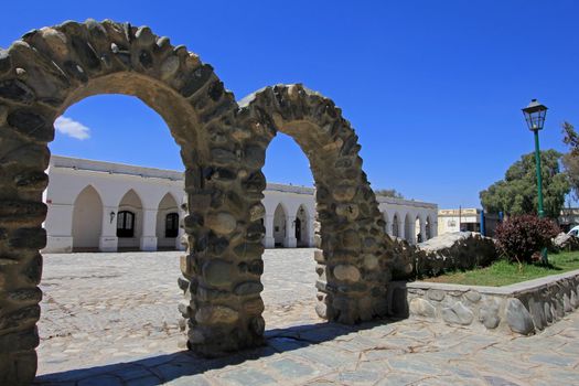 Arches behind main square, mountain village Cachi, , Calchaques, Salta Northern Argentina