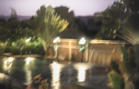 Abstract blur Beautiful luxury village swimming pool at Twilights time