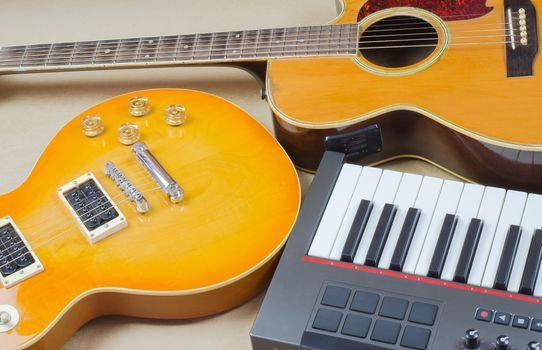 Electric guitar and keyboard  musical close-up  isoled