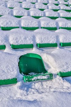 Background chairs at stadium , winter