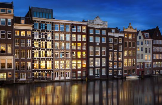 Wonderful view on houses of Amsterdam in night,Netherlands.