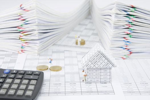 House with golfer on finance account have blur people play golf and pile of gold coins with calculator and pile overload paperwork of report and receipt with colorful paperclip as background.