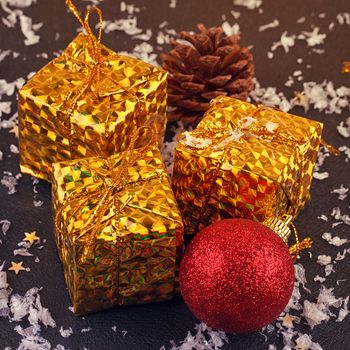 Christmas decorative gift box, ball on black background