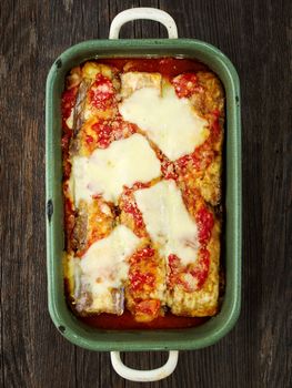 close up of rustic traditional italian eggplant parmesan