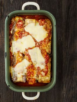 close up of rustic traditional italian eggplant parmesan