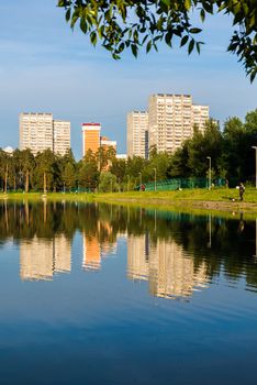 House reflected in the lake at sunset light in Zelenograd district of Moscow, Russia