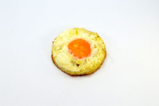 Egg on the plate on a white background