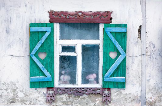 Window of the old house in the Russian village in the north