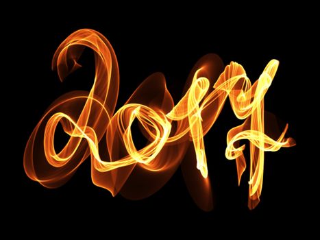 Happy new year 2017 isolated numbers lettering written with fire flame or smoke on black background.