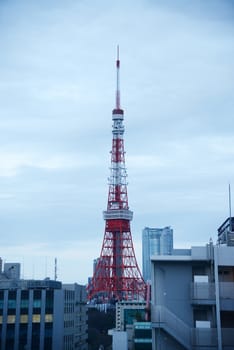 tokyo tower with cloudy sky