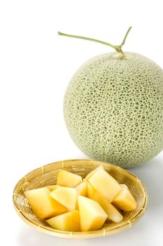 freshly cut cantaloupe melon on white background