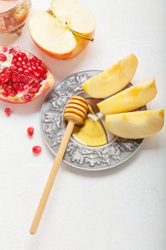 Apples, pomegranate and honey for Rosh Hashanah .