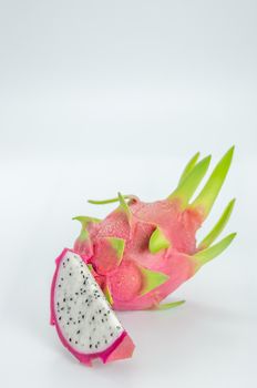 Ripe Dragon fruit or Pitaya with slice on white background