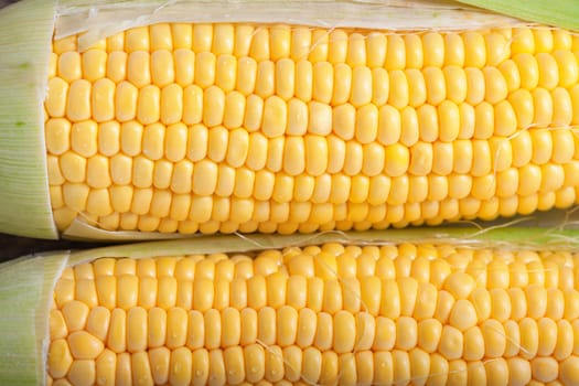 Pattern of Fresh yellow sweet corn on the table