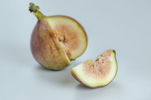 sliced fresh figs fruit on white background