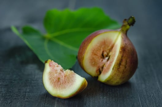 Portion of fresh Figs on wooden background