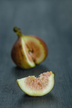 Portion of fresh Figs on wooden background