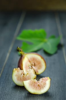 Portion of fresh Figs on wooden background