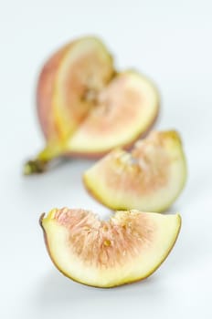 sliced fresh figs fruit on white background