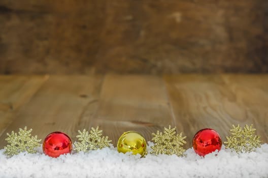 Christmas Decoration With Snow Over Wooden Background