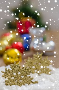 Christmas Decoration With Snow Over Wooden Background