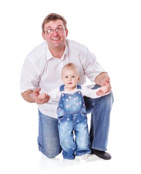 Father with baby girl posing isolated on white