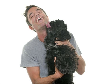 man and american cocker in front of white background