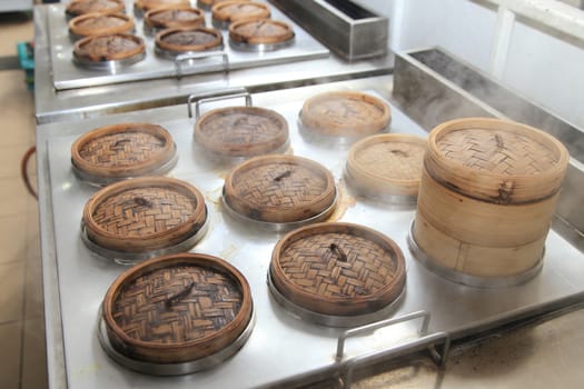 steam food in bamboo pot with smoke