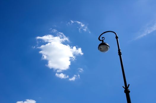 Street lamp on background of blue sky