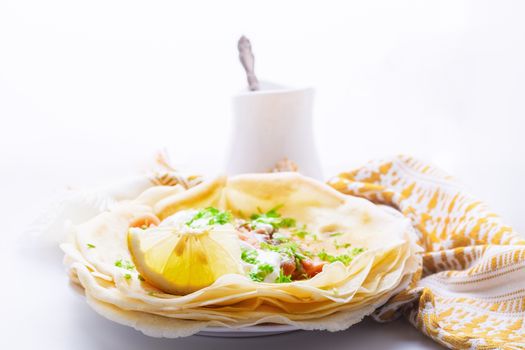 Crispy crepes with smoked salmon  and  cream cheese.