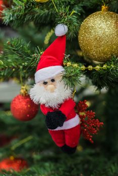 Christmas decorations on a Christmas tree. Christmas decorations like Santa Claus