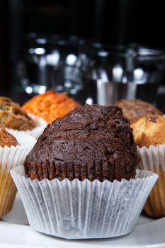 Different kinds of muffins on the kitchen table