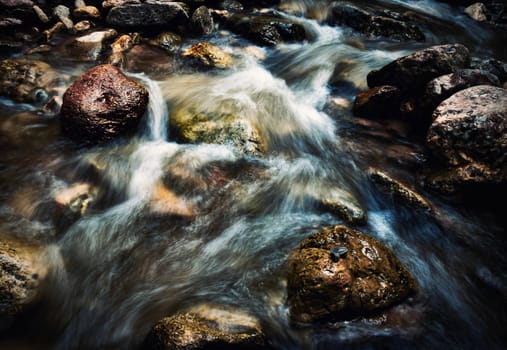seasonal background autumn stream with wild white water