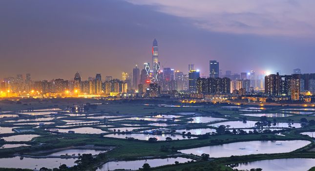 Shenzhen citscape at night , view from hiong kong countryside