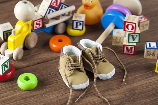 Children's World toy on a wooden background. Studio shot]