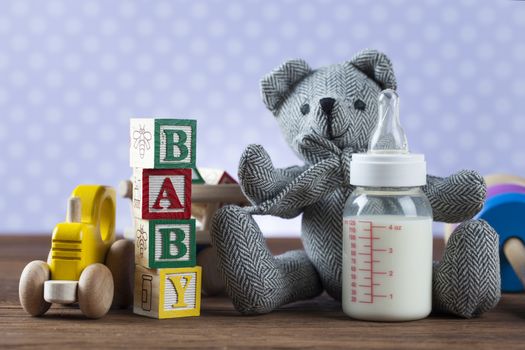 Children's World toy on a wooden background. Studio shot]