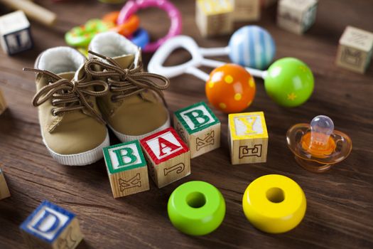 Children's World toy on a wooden background. Studio shot]