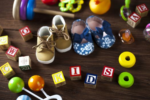 Children's World toy on a wooden background. Studio shot]