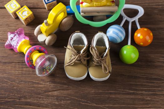 Children's World toy on a wooden background. Studio shot]