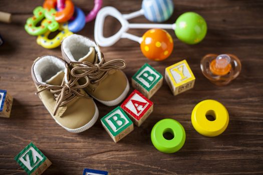 Children's World toy on a wooden background. Studio shot]