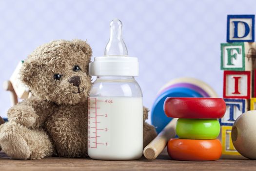 Children's World toy on a wooden background. Studio shot]