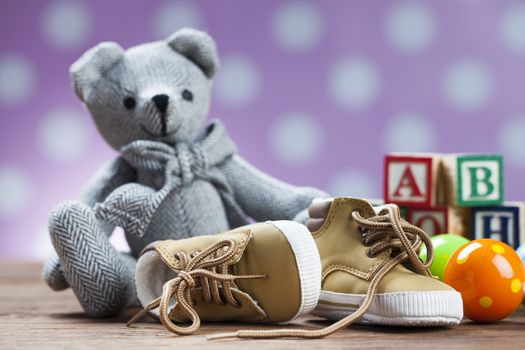 Children's World toy on a wooden background. Studio shot]