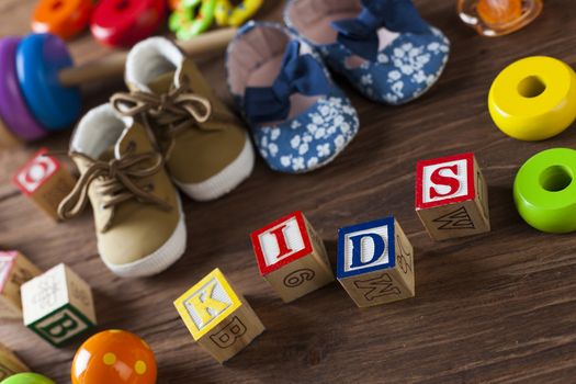 Children's World toy on a wooden background. Studio shot]