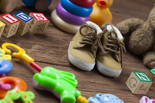 Children's World toy on a wooden background. Studio shot]