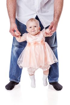Father holding little  baby girl posing isolated on white