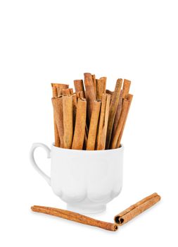 cinnamon stick in white cup isolated on white background, Save clipping path.