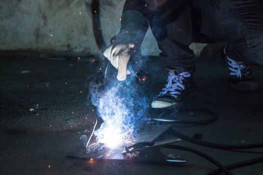 worker welding steel .